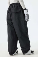 Women's Black Sleek Sport Utility Hidden Cargo Pockets Baggy Snow Pants